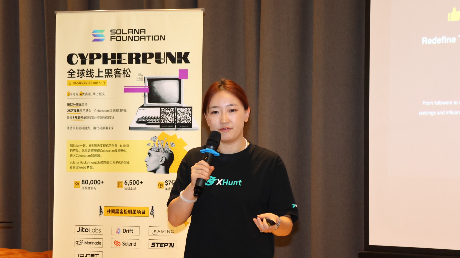 Solar Cypherpunk speaker presenting on stage